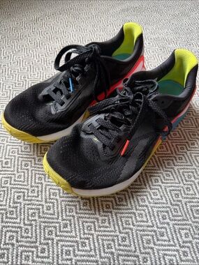 Reebok Women Nano X1 Black Running Shoes with Yellow, Red and Blue Accents